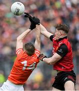30 April 2023; Andrew Murnin of Armagh in action against Ryan McEvoy of Down during the Ulster GAA Football Senior Championship Semi Final match between Armagh and Down at St Tiernach’s Park in Clones, Monaghan. Photo by Ramsey Cardy/Sportsfile