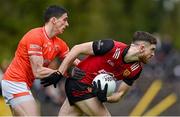 30 April 2023; Ryan McEvoy of Down in action against Rory Grugan of Armagh during the Ulster GAA Football Senior Championship Semi Final match between Armagh and Down at St Tiernach’s Park in Clones, Monaghan. Photo by Ramsey Cardy/Sportsfile