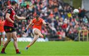 30 April 2023; Rian O'Neill of Armagh kicks a free during the Ulster GAA Football Senior Championship Semi Final match between Armagh and Down at St Tiernach’s Park in Clones, Monaghan. Photo by Ramsey Cardy/Sportsfile