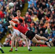 30 April 2023; Andrew Murnin of Armagh in action against Daniel Guinness of Down during the Ulster GAA Football Senior Championship Semi Final match between Armagh and Down at St Tiernach’s Park in Clones, Monaghan. Photo by Ramsey Cardy/Sportsfile
