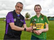 30 April 2023; Pictured is referee John Burke and Roisin Quinn of Kerry, who was named the Electric Ireland player of the match following her performance for Kerry in today’s Electric Ireland Camogie Minor C All-Ireland Championship Semi Final against Wicklow at St. Flannan's Park in Moneygall, Tipperary. Follow all the action in the Electric Ireland Camogie Minor Championships on social media @ElectricIreland and via the hashtag #ThisIsMajor, or for more information go to https://www.electricireland.ie/camogie-minor-championships. Photo by Tom Beary/Sportsfile