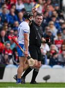 30 April 2023; Referee James Owens shows a yellow card to Conor Gleeson of Waterford during the Munster GAA Hurling Senior Championship Round 2 match between Cork and Waterford at Páirc Uí Chaoimh in Cork. Photo by Brendan Moran/Sportsfile