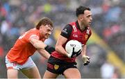 30 April 2023; Ryan Johnston of Down in action against Jason Duffy of Armagh during the Ulster GAA Football Senior Championship Semi Final match between Armagh and Down at St Tiernach’s Park in Clones, Monaghan. Photo by Ramsey Cardy/Sportsfile