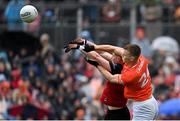 30 April 2023; Rian O'Neill of Armagh in action against Ryan McEvoy of Down during the Ulster GAA Football Senior Championship Semi Final match between Armagh and Down at St Tiernach’s Park in Clones, Monaghan. Photo by Ramsey Cardy/Sportsfile