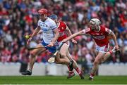 30 April 2023; Calum Lyons of Waterford is tackled by Conor Lehane and Shane Barrett of Cork during the Munster GAA Hurling Senior Championship Round 2 match between Cork and Waterford at Páirc Uí Chaoimh in Cork. Photo by Brendan Moran/Sportsfile