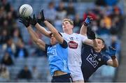 30 April 2023; Daniel Flynn of Kildare in action against Dublin players David Byrne, left, and goalkeeper Stephen Cluxton during the Leinster GAA Football Senior Championship Semi Final match between Dublin and Kildare at Croke Park in Dublin. Photo by Seb Daly/Sportsfile