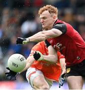 30 April 2023; Danny Magill of Down in action against Rory Grugan of Armagh during the Ulster GAA Football Senior Championship Semi Final match between Armagh and Down at St Tiernach’s Park in Clones, Monaghan. Photo by Ramsey Cardy/Sportsfile
