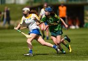 30 April 2023; Ciara Lancaster of Wicklow in action against Ciara O'Sullivan of Kerry during the Electric Ireland Camogie Minor C All-Ireland Championship Semi Final match between Kerry and Wicklow at St. Flannan's Park in Moneygall, Tipperary. Photo by Tom Beary/Sportsfile