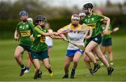 30 April 2023; Ciara Connolly of Wicklow in action against Yen Leniston of Kerry during the Electric Ireland Camogie Minor C All-Ireland Championship Semi Final match between Kerry and Wicklow at St. Flannan's Park in Moneygall, Tipperary. Photo by Tom Beary/Sportsfile