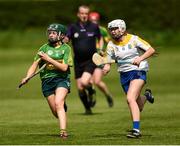 30 April 2023; Tara Burke of Kerry in action against Emma Kinnear of Wicklow during the Electric Ireland Camogie Minor C All-Ireland Championship Semi Final match between Kerry and Wicklow at St. Flannan's Park in Moneygall, Tipperary. Photo by Tom Beary/Sportsfile