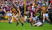 30 April 2023; Mikey Butler of Kilkenny passes the sliotar unders pressure from Conor Whelan of Galway during the Leinster GAA Hurling Senior Championship Round 2 match between Kilkenny and Galway at UPMC Nowlan Park in Kilkenny. Photo by Ray McManus/Sportsfile