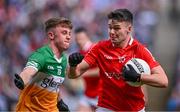 30 April 2023; Liam Jackson of Louth and Jack Bryant of Offaly during the Leinster GAA Football Senior Championship Semi Final match between Louth and Offaly at Croke Park in Dublin. Photo by Ben McShane/Sportsfile