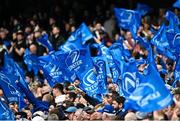 29 April 2023; Leinster supporters wave flags during the Heineken Champions Cup Semi Final match between Leinster and Toulouse at the Aviva Stadium in Dublin. Photo by Ramsey Cardy/Sportsfile