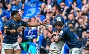 29 April 2023; Jason Jenkins of Leinster celebrates with Michael Ala'alatoa, left, and Andrew Porter after scoring their side's fifth try during the Heineken Champions Cup Semi Final match between Leinster and Toulouse at the Aviva Stadium in Dublin. Photo by Ramsey Cardy/Sportsfile