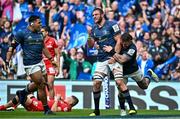 29 April 2023; Jason Jenkins of Leinster celebrates with Michael Ala'alatoa, left, and Andrew Porter after scoring their side's fifth try during the Heineken Champions Cup Semi Final match between Leinster and Toulouse at the Aviva Stadium in Dublin. Photo by Ramsey Cardy/Sportsfile
