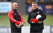 28 April 2023; Derry City assistant manager Paddy McLaughlin, left, and First team coach Conor Loughrey before the SSE Airtricity Men's Premier Division match between Derry City and St Patrick's Athletic at The Ryan McBride Brandywell Stadium in Derry. Photo by Ramsey Cardy/Sportsfile