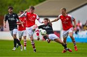 1 May 2023; Kailin Barlow of Sligo Rovers in action against St Patrick's Athletic players Chris Forrester, left, and Thijs Timmermans during the SSE Airtricity Men's Premier Division match between St Patrick's Athletic and Sligo Rovers at Richmond Park in Dublin. Photo by Ben McShane/Sportsfile