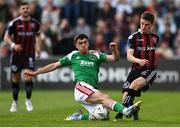 1 May 2023; Paddy Kirk of Bohemians is tackled by Barry Coffey of Cork City during the SSE Airtricity Men's Premier Division match between Bohemians and Cork City at Dalymount Park in Dublin. Photo by Harry Murphy/Sportsfile