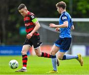 1 May 2023; Darragh Leahy of Dundalk in action against Ciaran Behan of UCD during the SSE Airtricity Men's Premier Division match between UCD and Dundalk at UCD Bowl in Dublin. Photo by Stephen Marken/Sportsfile