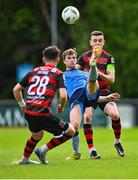 1 May 2023; Ciaran Behan of UCD in action against Ryan O'Kane, 28, and Darragh Leahy of Dundalk during the SSE Airtricity Men's Premier Division match between UCD and Dundalk at UCD Bowl in Dublin. Photo by Stephen Marken/Sportsfile