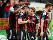 1 May 2023; Jordan Flores of Bohemians, second left, celebrates with teammates Jonathan Afolabi and Paddy Kirk after scoring his side's first goal during the SSE Airtricity Men's Premier Division match between Bohemians and Cork City at Dalymount Park in Dublin. Photo by Harry Murphy/Sportsfile