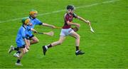 29 April 2023; Ryan Denning of Westmeath races clear of Dublin players Ben Small, 5, and Gavin Dixon during a half time game of the Leinster GAA Hurling Senior Championship Round 2 match between Dublin and Westmeath at Parnell Park in Dublin. Photo by Ray McManus/Sportsfile