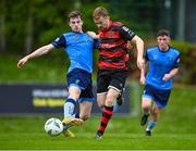 1 May 2023; Ciaran Behan of UCD in action against Paul Doyle of Dundalk during the SSE Airtricity Men's Premier Division match between UCD and Dundalk at UCD Bowl in Dublin. Photo by Stephen Marken/Sportsfile