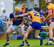 23 April 2023; Rory Hayes of Clare, 23, a second half substitute, jostles with Jake Morris of Tipperary, left, as he arrives in position, during the Munster GAA Hurling Senior Championship Round 1 match between Clare and Tipperary at Cusack Park in Ennis, Clare. Photo by Ray McManus/Sportsfile