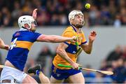 23 April 2023; Ryan Taylor of Clare in action against Michael Breen of Tipperary during the Munster GAA Hurling Senior Championship Round 1 match between Clare and Tipperary at Cusack Park in Ennis, Clare. Photo by Ray McManus/Sportsfile