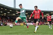 1 May 2023; Johnny Kenny of Shamrock Rovers in action against Cameron McJannet of Derry City during the SSE Airtricity Men's Premier Division match between Derry City and Shamrock Rovers at The Ryan McBride Brandywell Stadium in Derry. Photo by Ramsey Cardy/Sportsfile