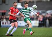 1 May 2023; Johnny Kenny of Shamrock Rovers in action against Shane McEleney of Derry City during the SSE Airtricity Men's Premier Division match between Derry City and Shamrock Rovers at The Ryan McBride Brandywell Stadium in Derry. Photo by Ramsey Cardy/Sportsfile