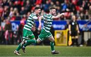 1 May 2023; Jack Byrne of Shamrock Rovers celebrates with Trevor Clarke, left, after scoring their side's second goal during the SSE Airtricity Men's Premier Division match between Derry City and Shamrock Rovers at The Ryan McBride Brandywell Stadium in Derry. Photo by Ramsey Cardy/Sportsfile