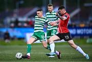 1 May 2023; Gary O'Neill of Shamrock Rovers in action against Cian Kavanagh of Derry City during the SSE Airtricity Men's Premier Division match between Derry City and Shamrock Rovers at The Ryan McBride Brandywell Stadium in Derry. Photo by Ramsey Cardy/Sportsfile