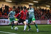 1 May 2023; Colm Whelan of Derry City is tackled by Neil Farrugia of Shamrock Rovers during the SSE Airtricity Men's Premier Division match between Derry City and Shamrock Rovers at The Ryan McBride Brandywell Stadium in Derry. Photo by Ramsey Cardy/Sportsfile