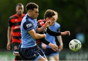 1 May 2023; Evan Osam of UCD in action against Alfie Lewis of Dundalk during the SSE Airtricity Men's Premier Division match between UCD and Dundalk at UCD Bowl in Dublin. Photo by Stephen Marken/Sportsfile