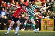 1 May 2023; Cian Kavanagh of Derry City is tackled by Sean Hoare of Shamrock Rovers during the SSE Airtricity Men's Premier Division match between Derry City and Shamrock Rovers at The Ryan McBride Brandywell Stadium in Derry. Photo by Ramsey Cardy/Sportsfile