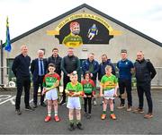 2 May 2023; At the launch of The Dillon Quirke Foundation fundraising in association with The Circet All-Ireland GAA Golf Challenge at the Clonoulty-Rossmore GAA Club in Tipperary is children from Clonoulty and Rossmore schools, from left, Rian Quinn, aged nine, Scott Wood, aged ten, Hazel Rayn, aged nine and Jamie O'Sullivan, aged eight, with inter-county hurling managers, from left, Henry Shefflin of Galway, John Kiely of Limerick, Darren Gleeson of Antrim, Darragh Egan of Wexford, Pat Ryan of Cork, Davy Fitzgerald of Waterford, Stephen Molumphy of Kerry and Liam Cahill of Tipperary. The Foundation are calling on all GAA clubs to provide €100 towards providing cardiac screening across the association. To donate, visit bit.ly/doitfordillon. Photo by Harry Murphy/Sportsfile