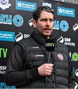 5 May 2023; Derry City head coach Ruaidhrí Higgins speaks to LOI TV before the SSE Airtricity Men's Premier Division match between Drogheda United and Derry City at Weaver's Park in Drogheda, Louth. Photo by Stephen Marken/Sportsfile