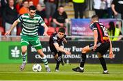 5 May 2023; Neil Farrugia of Shamrock Rovers in action against Paddy Kirk of Bohemians, centre, and Keith Buckley during the SSE Airtricity Men's Premier Division match between Shamrock Rovers and Bohemians at Tallaght Stadium in Dublin. Photo by Tyler Miller/Sportsfile