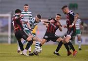 5 May 2023; Jack Byrne of Shamrock Rovers holds off the challenges of Bohemians players, from left, Declan McDaid, Keith Buckley, and Adam McDonnell during the SSE Airtricity Men's Premier Division match between Shamrock Rovers and Bohemians at Tallaght Stadium in Dublin. Photo by Ben McShane/Sportsfile
