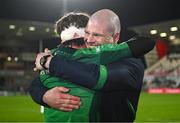 5 May 2023; Connacht head coach Pete Wilkins and Mack Hansen of Connacht embrace after their side's victory in the United Rugby Championship Quarter-Final match between Ulster and Connacht at Kingspan Stadium in Belfast. Photo by Harry Murphy/Sportsfile