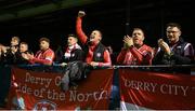 5 May 2023; Derry City supporters celebrate after the SSE Airtricity Men's Premier Division match between Drogheda United and Derry City at Weaver's Park in Drogheda, Louth. Photo by Stephen Marken/Sportsfile