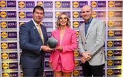 5 May 2023; The 2023 Teams of the Lidl Ladies National Football League awards were presented at Croke Park on Friday, May 5. The best players from the four divisions in the 2023 Lidl National Football Leagues were selected by the LGFA’s All Star committee. Laura Collins of Louth is pictured receiving her Division 3 award from Mícheál Naughton, Ladies Gaelic Football Association President, left, and Joe Mooney, Senior Partnerships Manager, Lidl Ireland. Photo by David Fitzgerald/Sportsfile