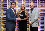 5 May 2023; The 2023 Teams of the Lidl Ladies National Football League awards were presented at Croke Park on Friday, May 5. The best players from the four divisions in the 2023 Lidl National Football Leagues were selected by the LGFA’s All Star committee. Niamh Coleman of Armagh is pictured receiving her Division 2 award from Mícheál Naughton, Ladies Gaelic Football Association President, left, and Joe Mooney, Senior Partnerships Manager, Lidl Ireland. Photo by David Fitzgerald/Sportsfile