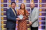 5 May 2023; The 2023 Teams of the Lidl Ladies National Football League awards were presented at Croke Park on Friday, May 5. The best players from the four divisions in the 2023 Lidl National Football Leagues were selected by the LGFA’s All Star committee. Blaithín Mackin of Armagh is pictured receiving her Division 2 award from Mícheál Naughton, Ladies Gaelic Football Association President, left, and Joe Mooney, Senior Partnerships Manager, Lidl Ireland. Photo by David Fitzgerald/Sportsfile