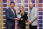5 May 2023; The 2023 Teams of the Lidl Ladies National Football League awards were presented at Croke Park on Friday, May 5. The best players from the four divisions in the 2023 Lidl National Football Leagues were selected by the LGFA’s All Star committee. Eimear Kiely of Cork is pictured receiving her Division 1 award from Mícheál Naughton, Ladies Gaelic Football Association President, left, and Joe Mooney, Senior Partnerships Manager, Lidl Ireland. Photo by David Fitzgerald/Sportsfile
