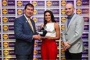 5 May 2023; The 2023 Teams of the Lidl Ladies National Football League awards were presented at Croke Park on Friday, May 5. The best players from the four divisions in the 2023 Lidl National Football Leagues were selected by the LGFA’s All Star committee. Clodagh Dunne of Laois is pictured receiving her Division 2 award from Mícheál Naughton, Ladies Gaelic Football Association President, left, and Joe Mooney, Senior Partnerships Manager, Lidl Ireland. Photo by David Fitzgerald/Sportsfile