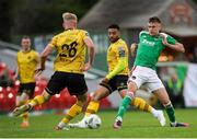 5 May 2023; Joseph O'Brien Whitmarsh of Cork City in action against Jay McGrath, left, and Jake Mulraney of St Patrick's Athletic during the SSE Airtricity Men's Premier Division match between Cork City and St Patrick's Athletic at Turner's Cross in Cork. Photo by Michael P Ryan/Sportsfile