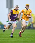 29 April 2023; Cathal Dunbar of Wexford in action against Niall O'Connor of Antrim during the Leinster GAA Hurling Senior Championship Round 2 match between Wexford and Antrim at Chadwicks Wexford Park in Wexford. Photo by Tyler Miller/Sportsfile
