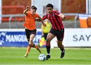 6 May 2023; Jamie Cummins of St Kevin's FC in action against Josh Okagbue of Cherry Orchard FC during the FAI Under 17 Cup Final 2022/23 match between Cherry Orchard FC and St Kevin’s Boys FC at Richmond Park in Dublin. Photo by Tyler Miller/Sportsfile